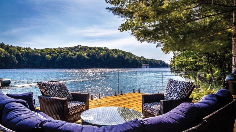 Frameless glass railings offer unaltered views of your Muskoka lake