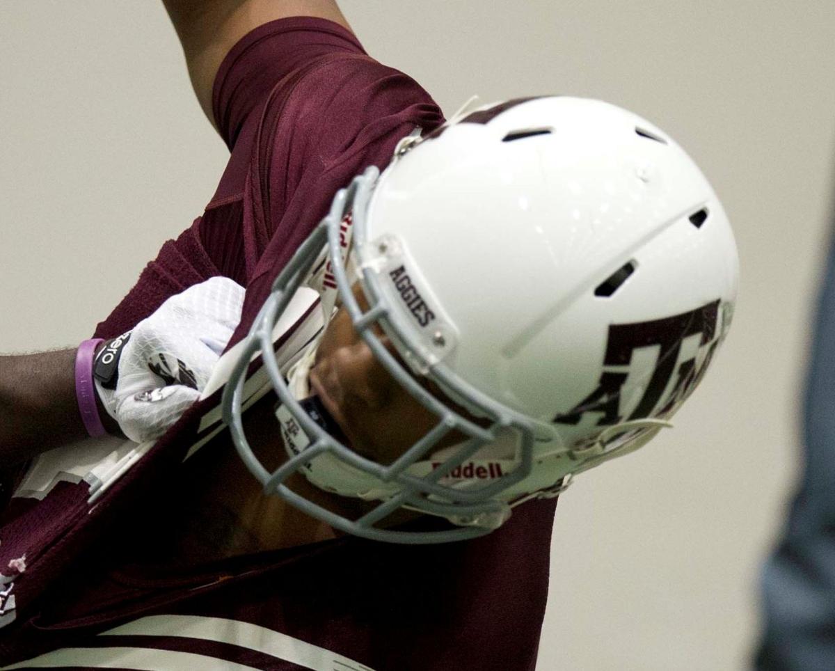 A&M football players using special mouthpieces to measure collision