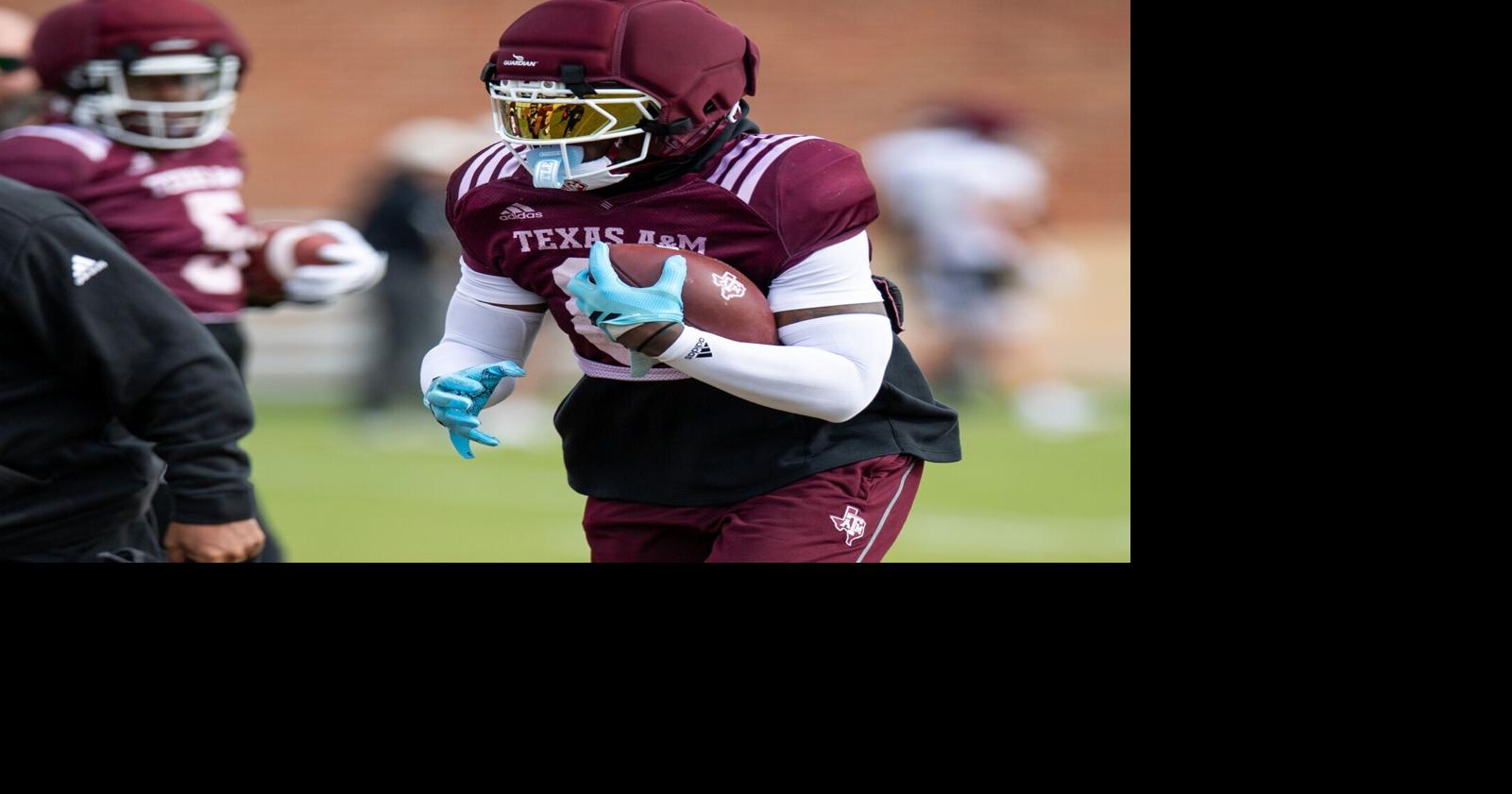 Texas A&M RB Moss, LB Williams, S Anderson participate during open practice