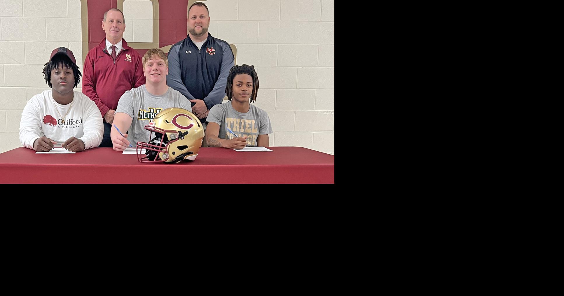 HC football trio holds signings High School