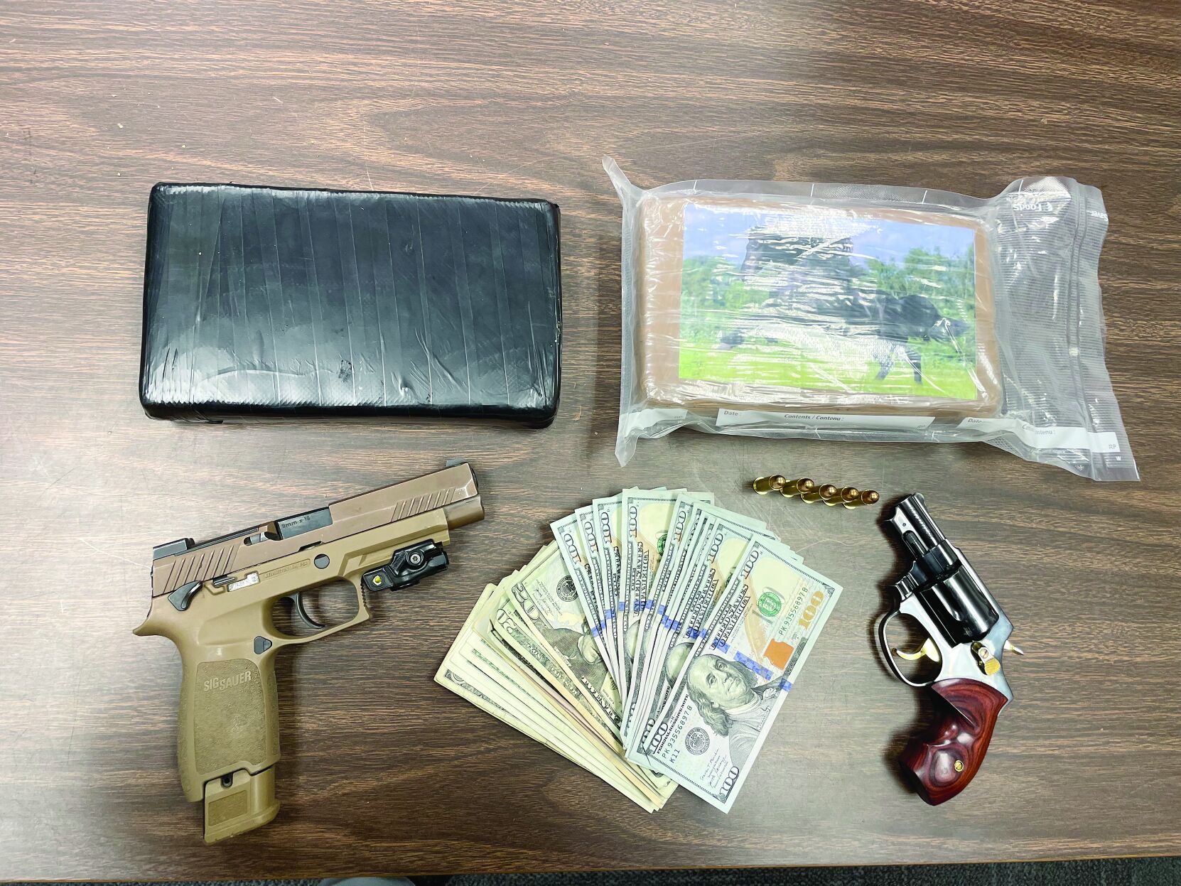 Over 10 lbs of cocaine, guns seized in traffic stop | News ...