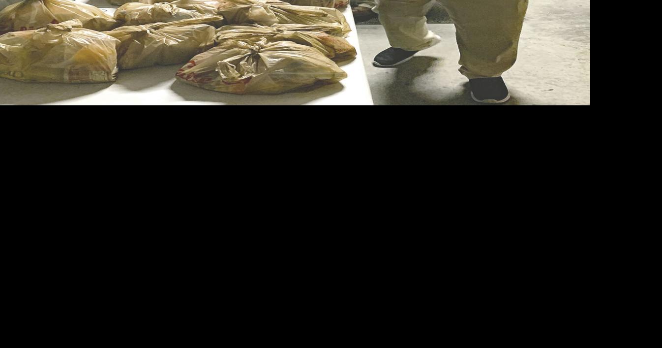 Preparing food for Buddy Backpacks | Announcements | mydailyrecord.com