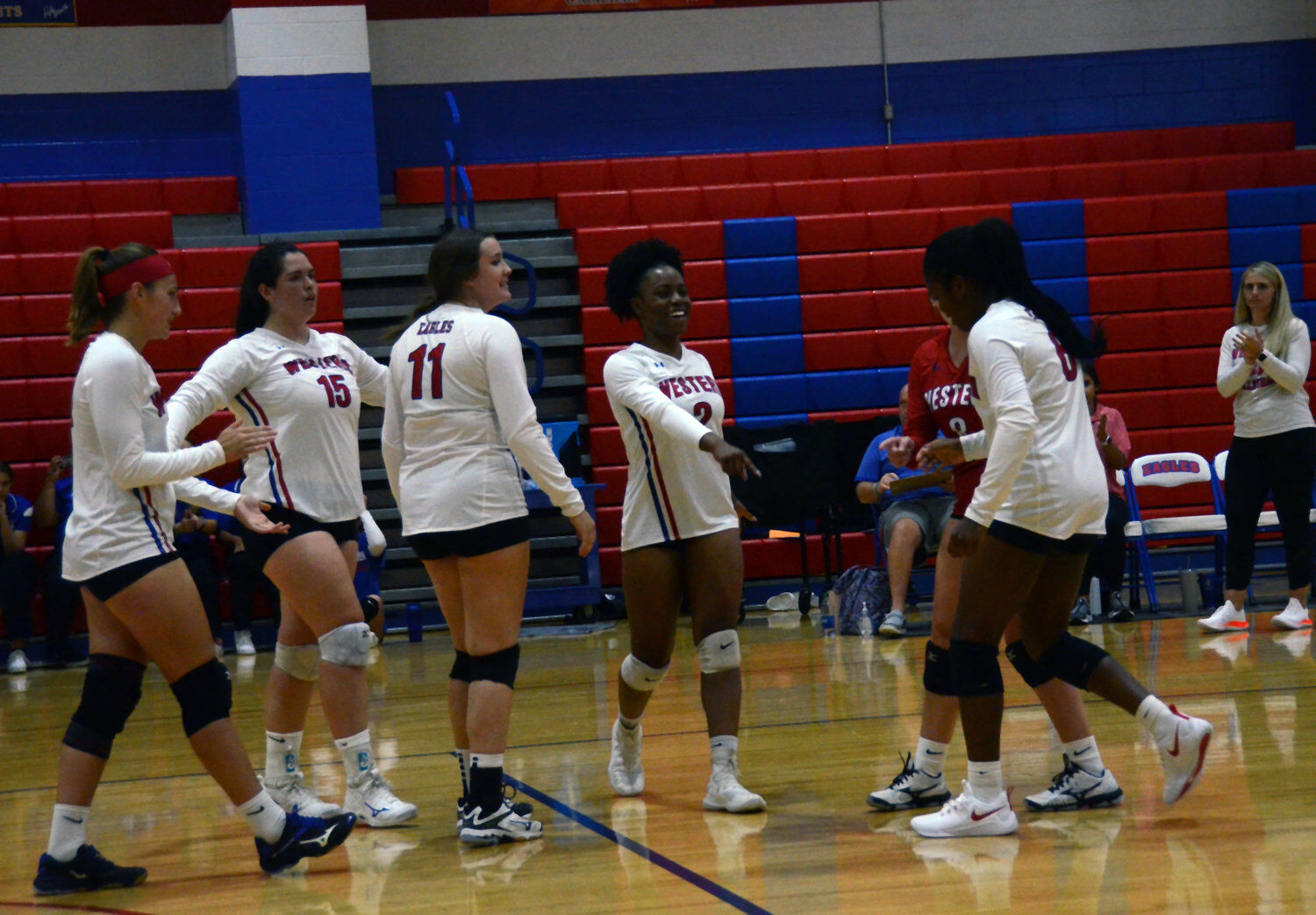 Mackey pushing Lady Eagles in final image