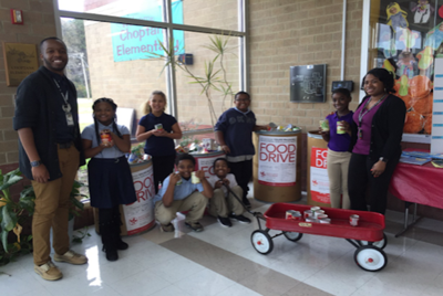 choptank elementary drive food school myeasternshoremd ambassadors lead student worker mentor omar bolden coleman pose students social left after