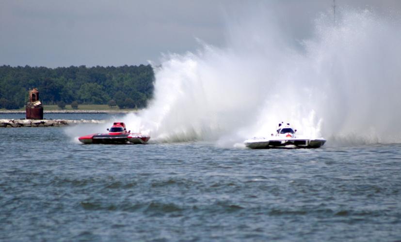 Two racers round a turn during the Cambridge Classic powerboat race