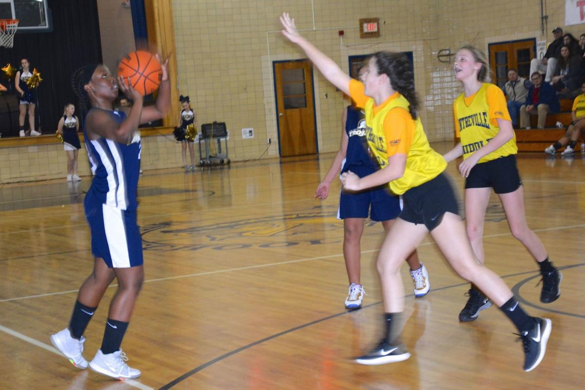 Trojans Finish 9 0 In Middle School Girls Basketball Spotlight