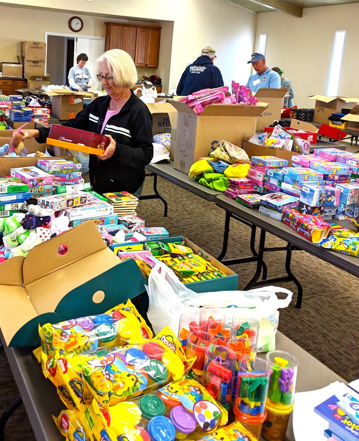 Operation Christmas Child collects record number of gift-filled boxes | Faith | myheraldreview.com