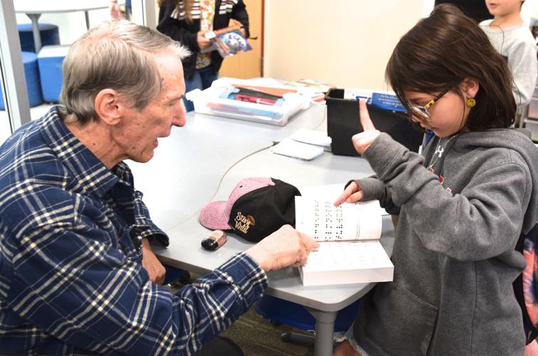 Benson Rotary honors memory of Bobcats grad with dictionary gifts