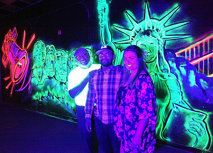 It’s glow time; Lights Out provides family fun under black lights
