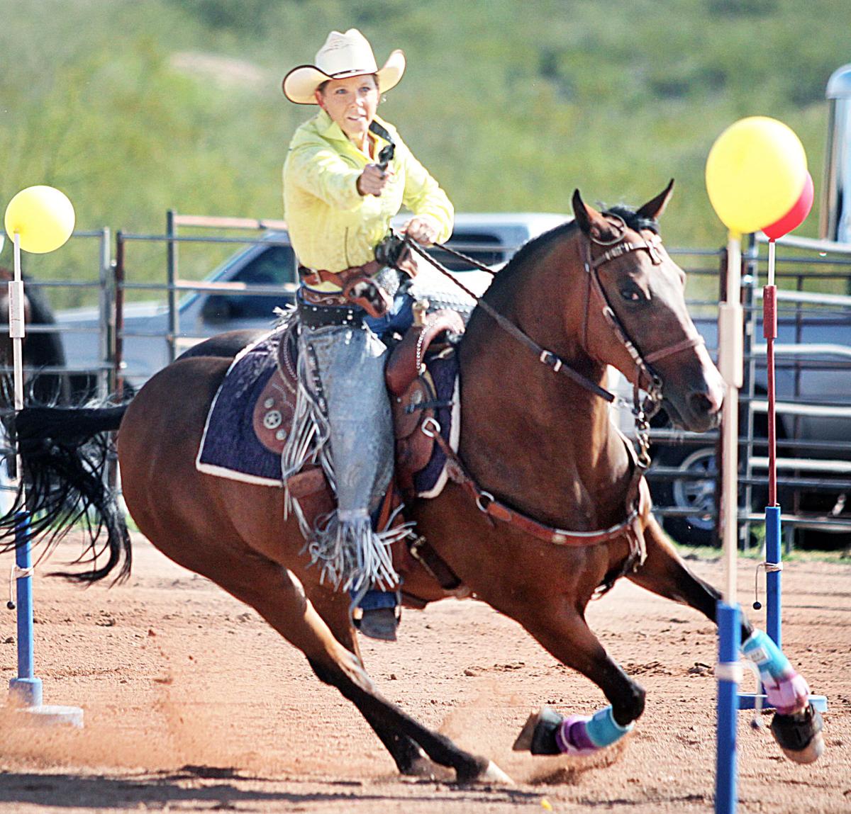 photo Cowboy Shooting On Horseback the sport of firing guns from horseback