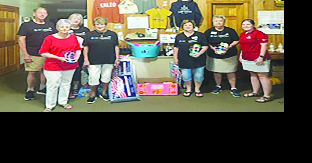 AT&T Telephone Pioneers donate items to Camp Kaleo
