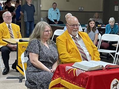 Susan and Joey Proctor smile at the ceremony celebrating Joey's promotion to the Pilgrim Degree of Merit by the Loyal Order of Moose at Monroe County Moose Lodge 2424.
