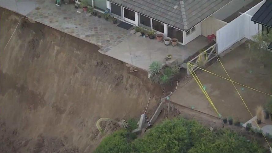 Portions of California home seen hanging over cliff after landslide in ...