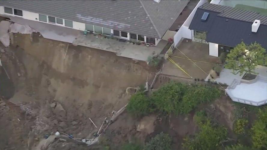 Portions of California home seen hanging over cliff after landslide in ...