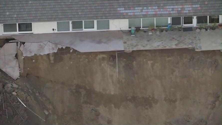 Portions of California home seen hanging over cliff after landslide in ...