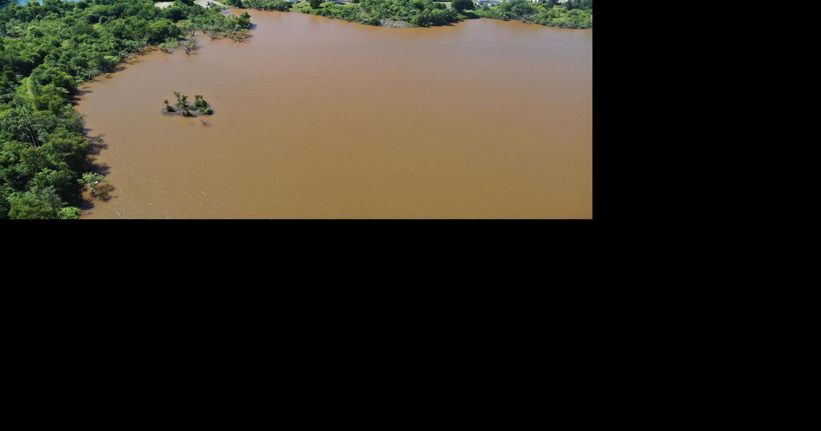 Marquette County lake becomes discolored, water level rises due to beaver dam breach