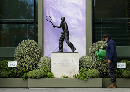 11 o'clock and all's silent on Wimbledon's would-be Day 1