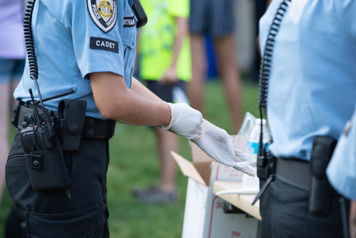Police officers with protective gloves