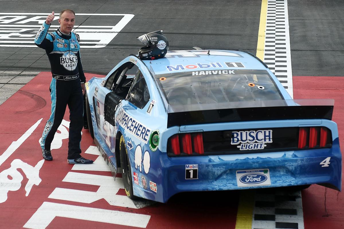 Kevin Harvick, driver of the #4 Busch Light YOURFACEHERE Ford, celebrates winning the NASCAR Cup Series The Real Heroes 400 at Darlington Raceway on Sunday, May 17, 2020 in Darlington, S.C. NASCAR resumes the season after the nationwide lockdown due to the ongoing coronavirus pandemic.