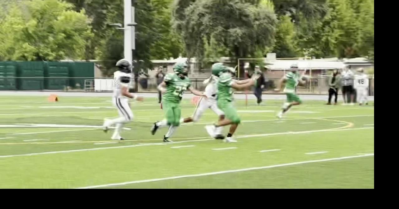 Calistoga's Santiago Cortez carries the ball between incomplete passes