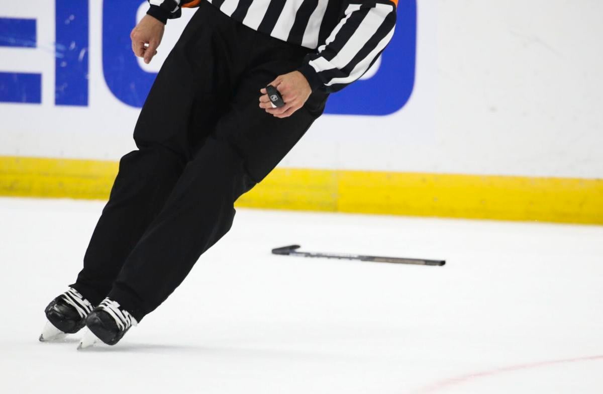 A broken stick remains on the ice as the Lightning take on the Hurricanes in Game 3..