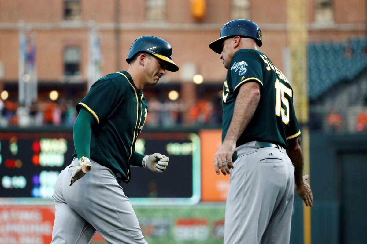 Healy hits 2 of Oakland's 4 HRs in 6-4 win over Orioles