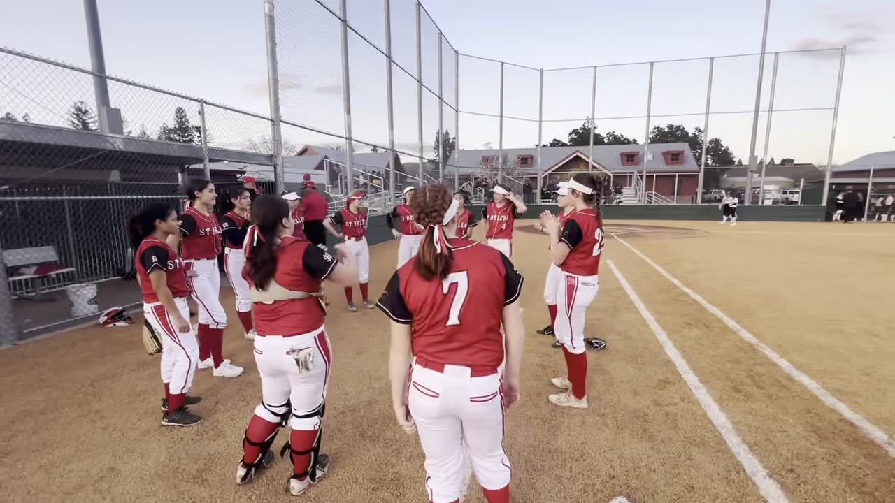 Video St. Helena High senior Beatrice Anagnostakis pumps up her softball teammates during a pre game talk then beats out an infield single against visiting Windsor on Feb. 22