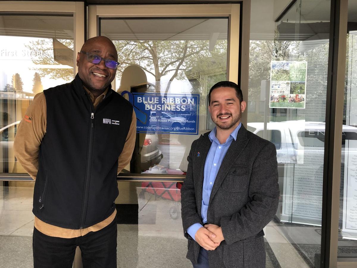Travis Stanley of the Napa Chamber of Commerce and Ricky Hurtado of Cope Family Center, support Blue Ribbon Month