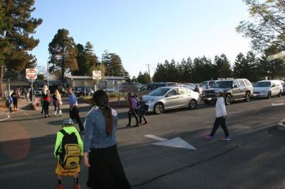 Donaldson Way Elementary School parents walking kids