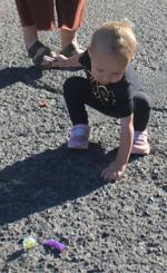 Child reaching for candy