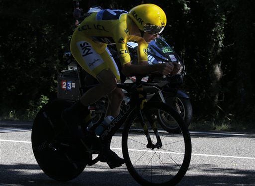 Froome stamps authority on day of mourning at Tour de France