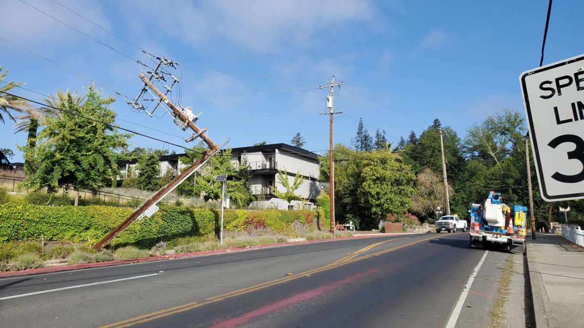 Power pole broken in crash