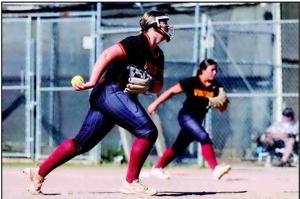 Softball rivalry draws a crowd