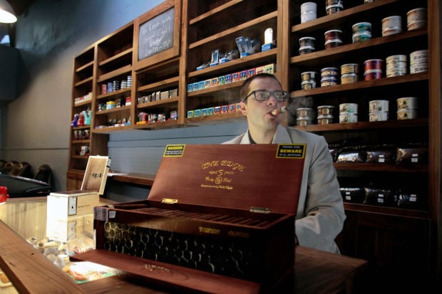 neighborhood tobacco Neighborhood tobacconist' moves shop downtown | Business