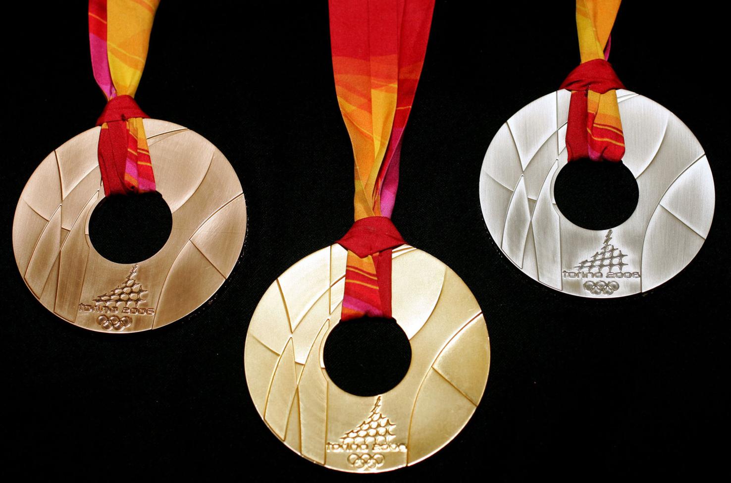 Here's a look at every Olympic gold medal design since 2000