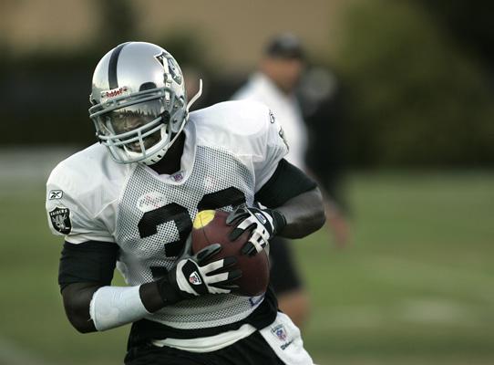 Oakland Raiders Nnamdi Asomugha (21) is all smile after