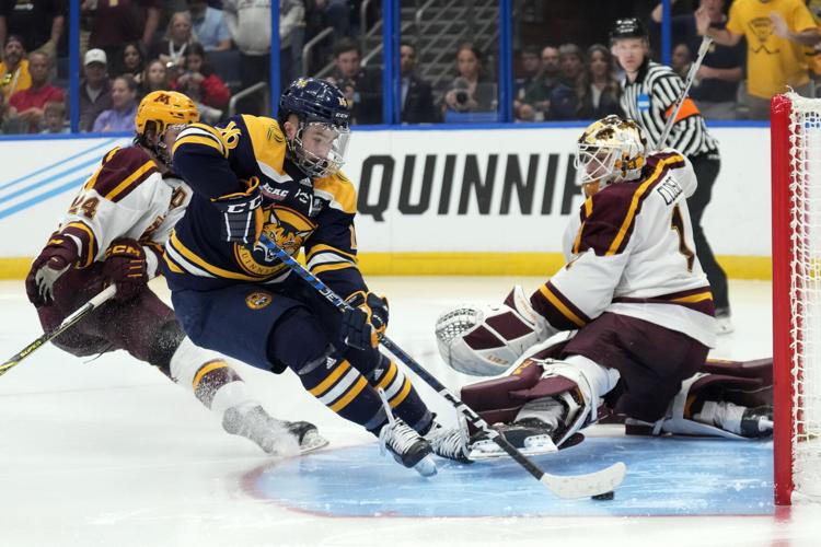 Quinnipiac's Bobcats hope to clinch the title at Frozen Four