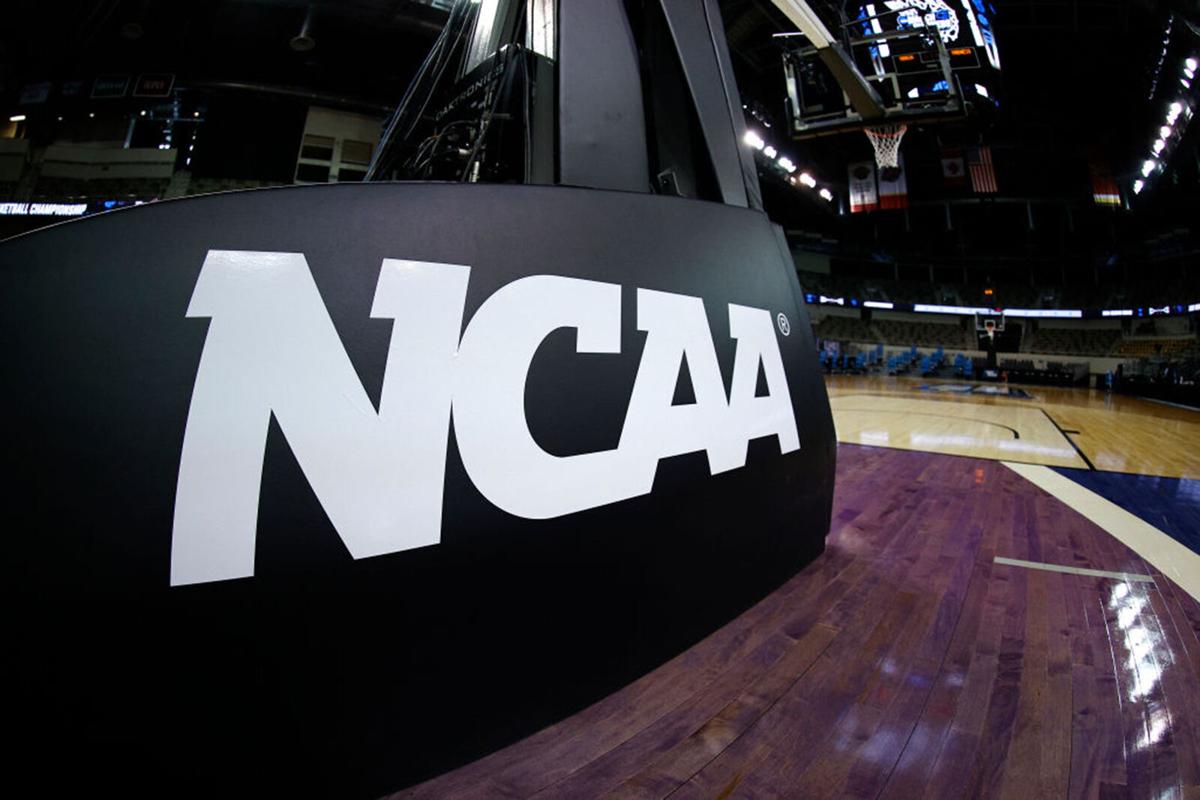 The NCAA logo is seen on the basket stanchion before the game between the Oral Roberts Golden Eagles and the Florida Gators in the second round game of the 2021 NCAA Men's Basketball Tournament at Indiana Farmers Coliseum on March 21, 2021 in Indianapolis, Indiana.
