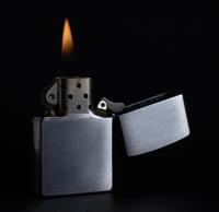 Refillable steel lighter