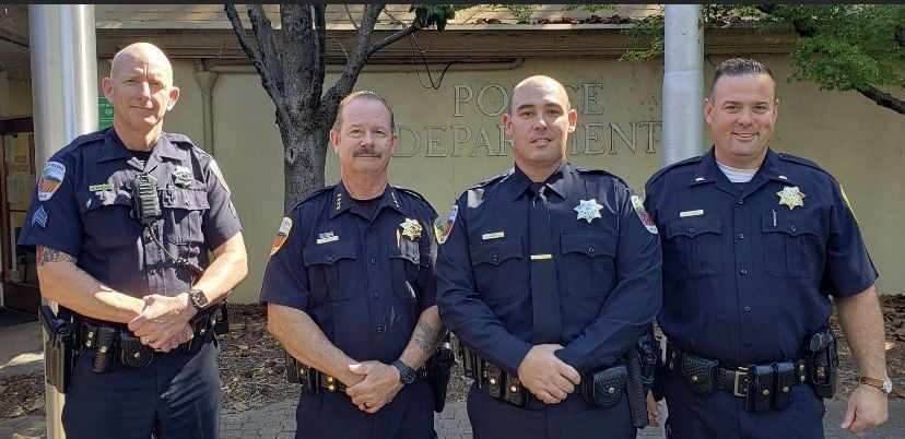 LJ Montelli with St. Helena police officers