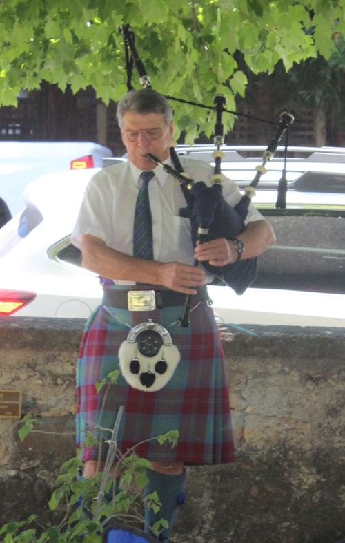 Lindsay Hall plays bagpipes