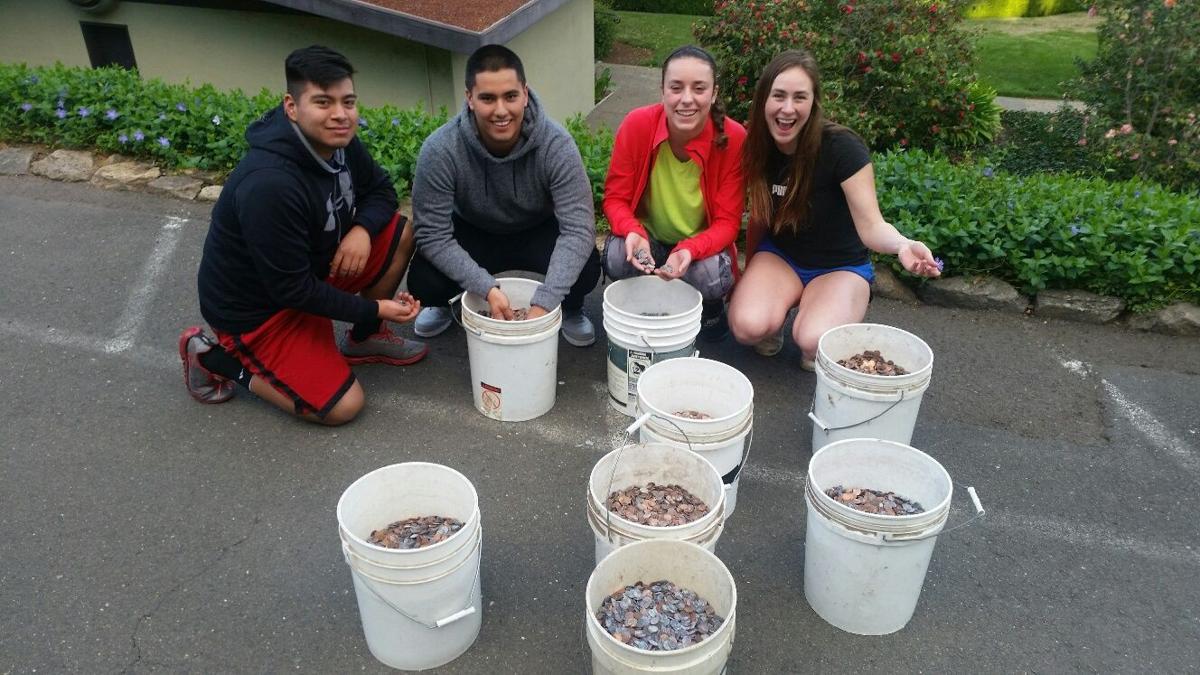 Beringer donates coins to Saints