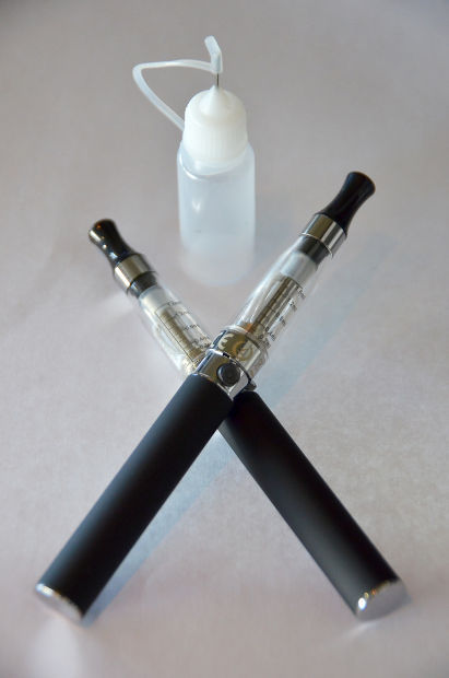 Three New Tech High grads distribute e cigarettes