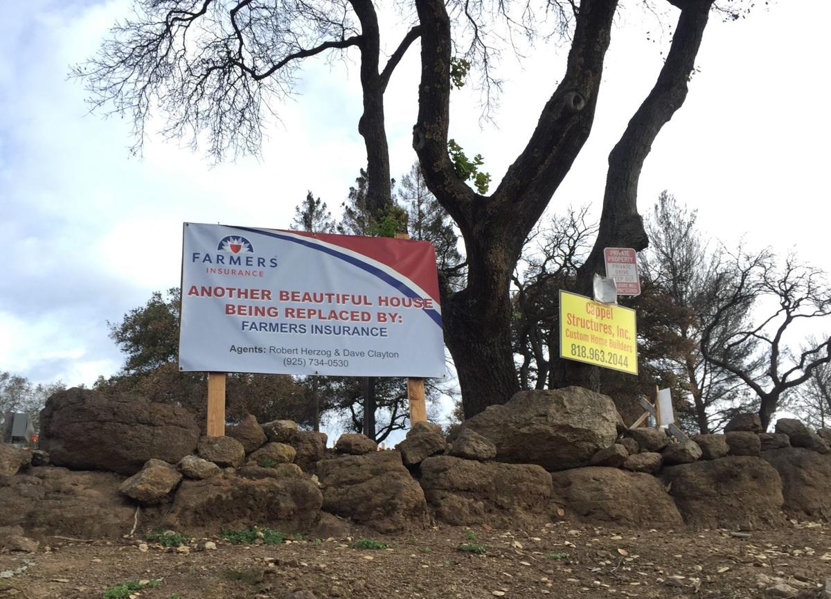 A rebuilding sign seen at a home site at Silverado Resort