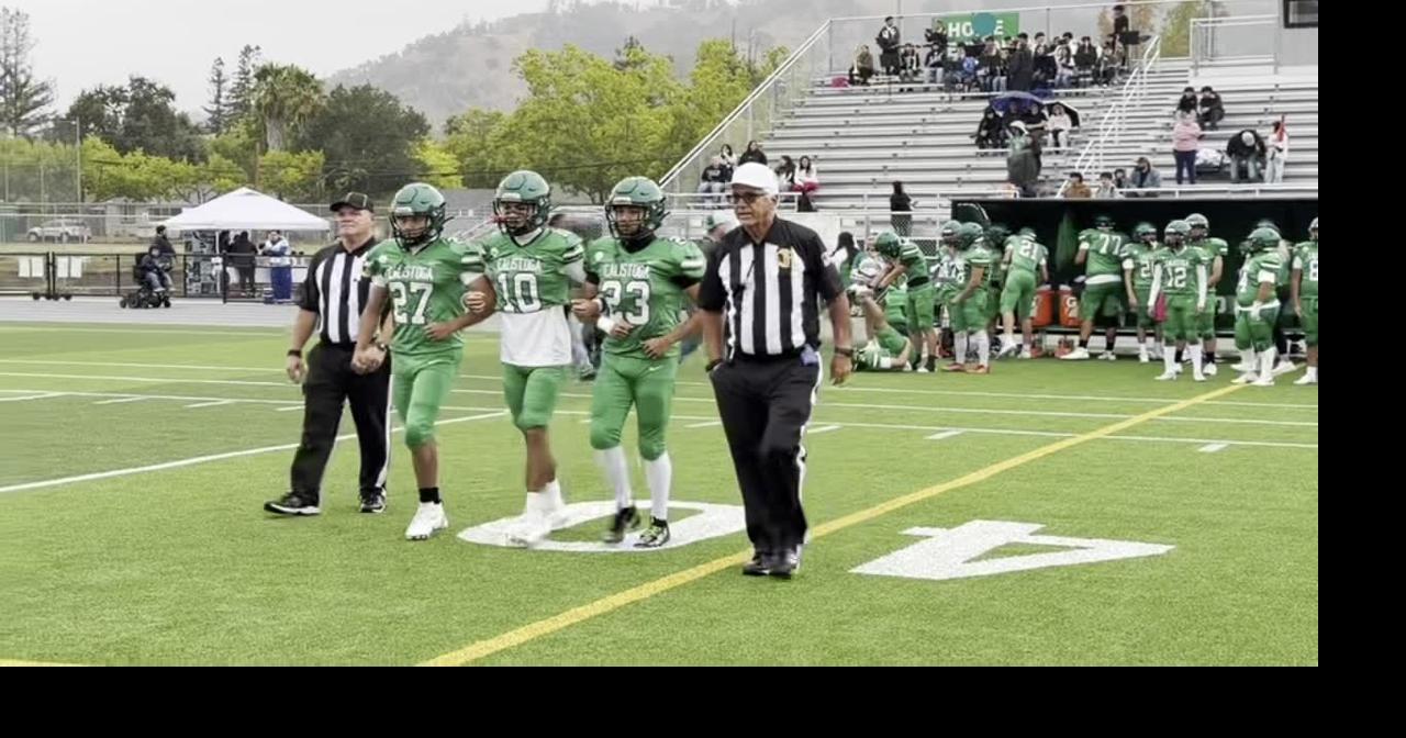 The Calistoga High football team warms up, Daniel Sandoval gets a tackle for a loss, and the Wildcats warm up after h...