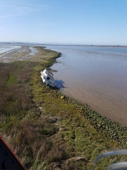 Aground houseboat on Napa River