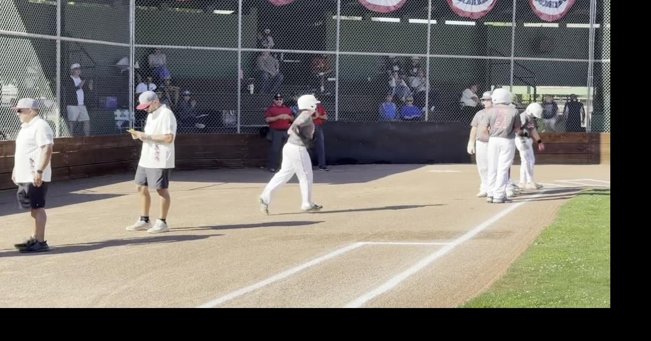 The American Canyon and St. Helena Little League Intermediate All-Stars are introduced, and St. Helena's Gabe Devore catches a Sergio Cruz popup