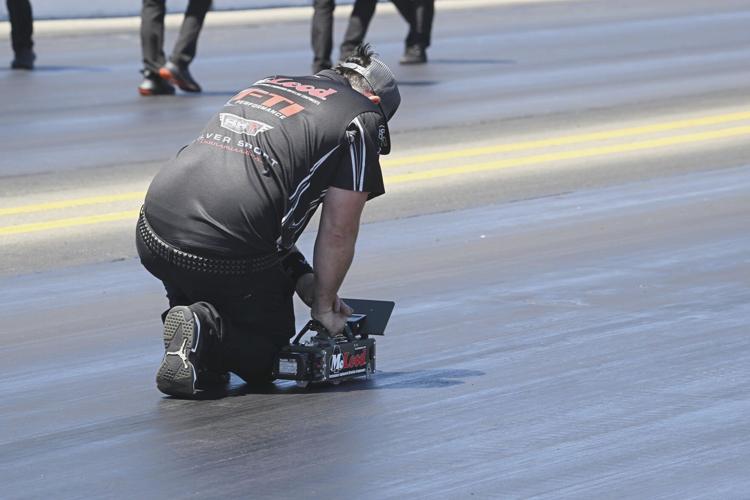 Motorsports: Men in black key to NHRA racers getting traction