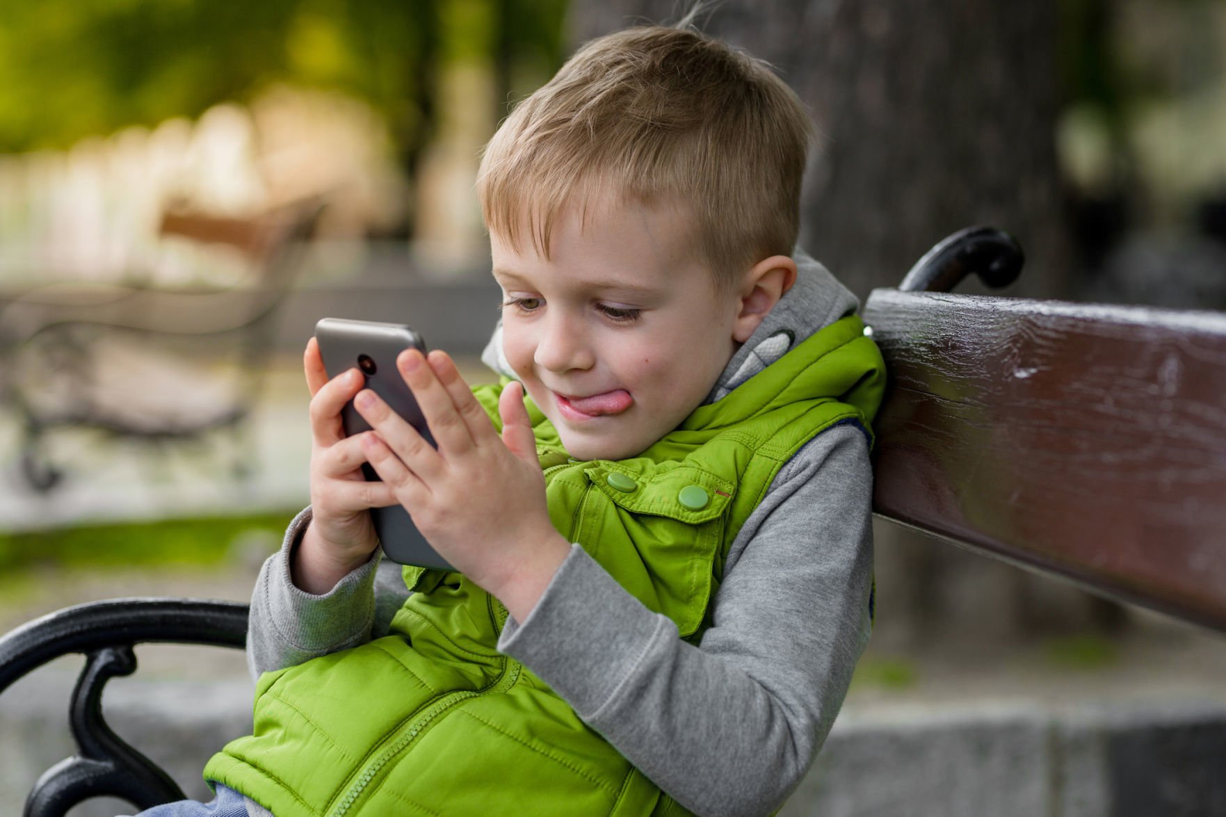 Expert Recommendations For A Child's First Phone, From Basic To Smart