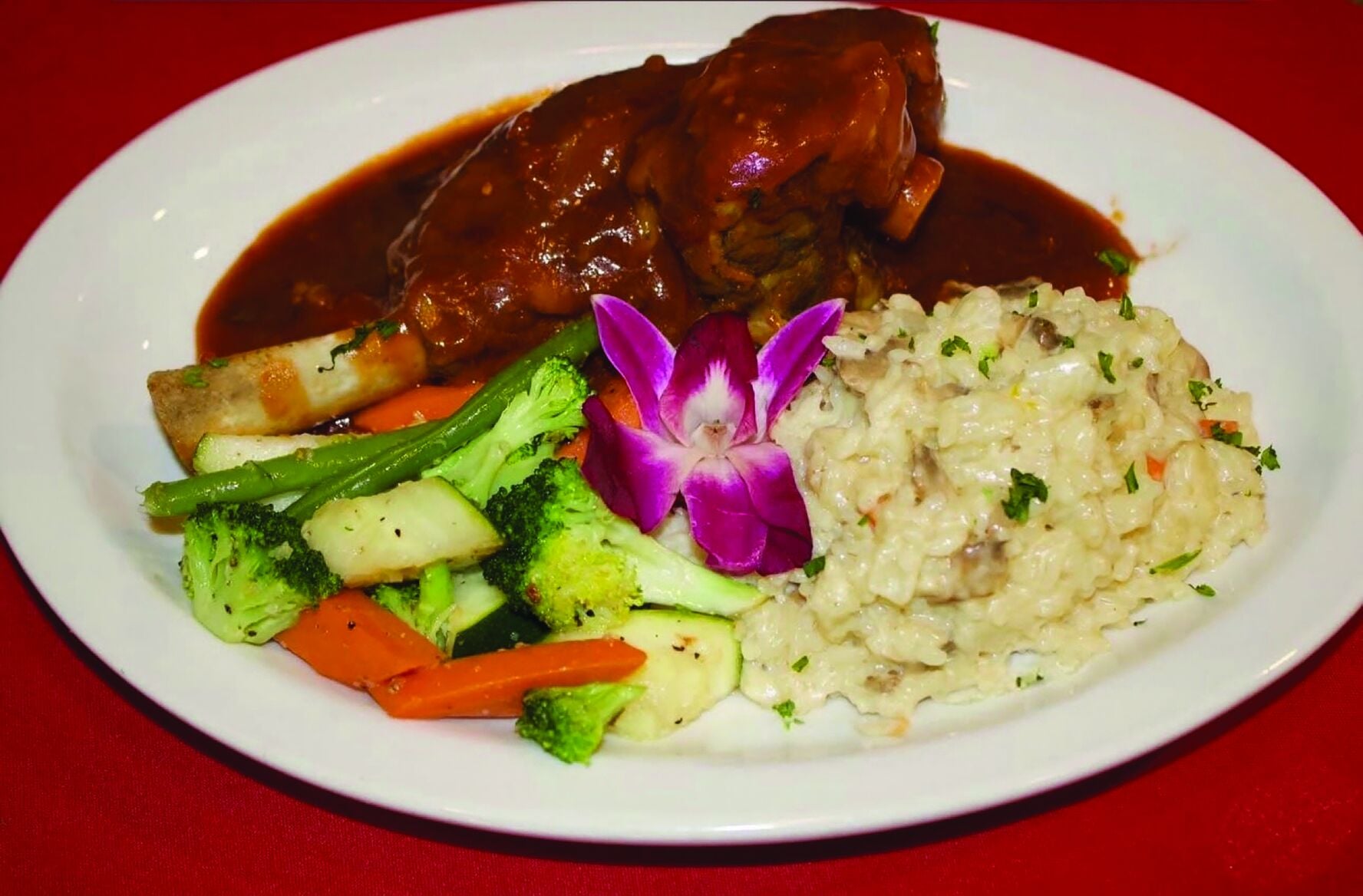 Lamb shank risotto Milanese. Photo courtesy Claritze Gonzalez and Ron Casterline Lamb shank risotto Milanese